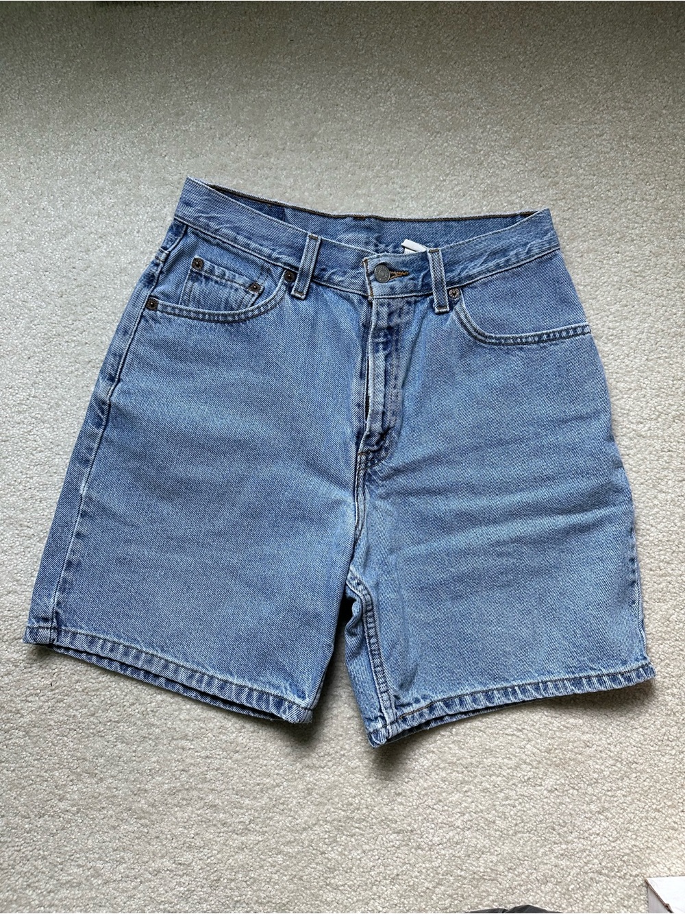 Vintage Levi’s high-rise shorts in light blue